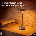 Compact wireless table lamp in a bedroom
