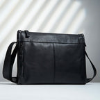 Leather crossbody bag worn over the shoulder
