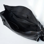 Adjustable shoulder strap and exterior pocket detail