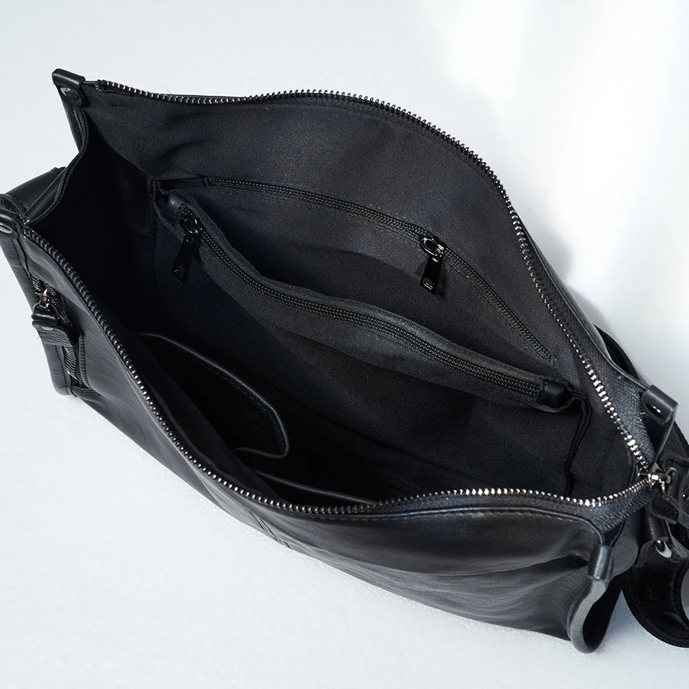 Adjustable shoulder strap and exterior pocket detail