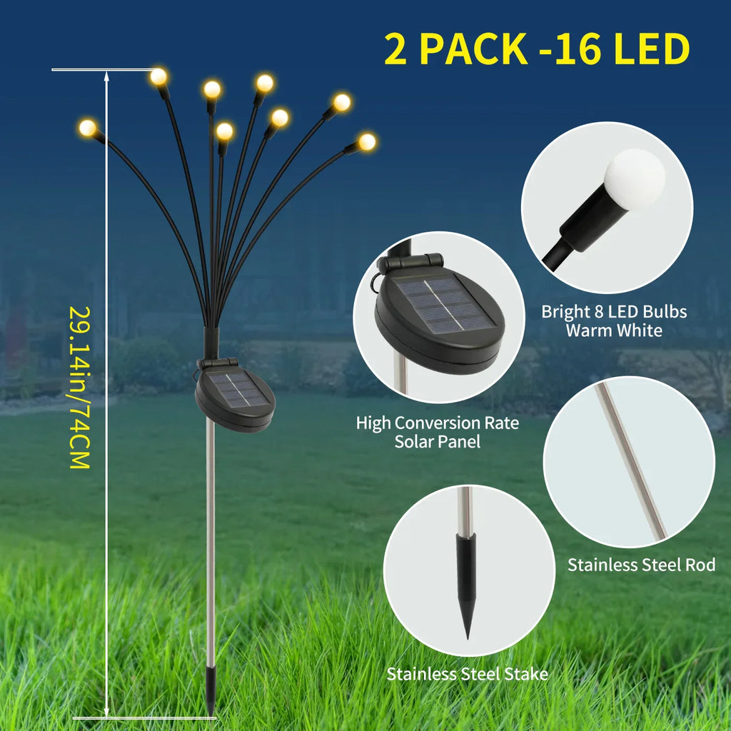 Outdoor solar firefly lights along a pathway
