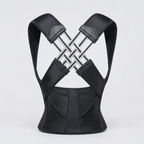 Black adjustable back posture corrector on a light gray studio background