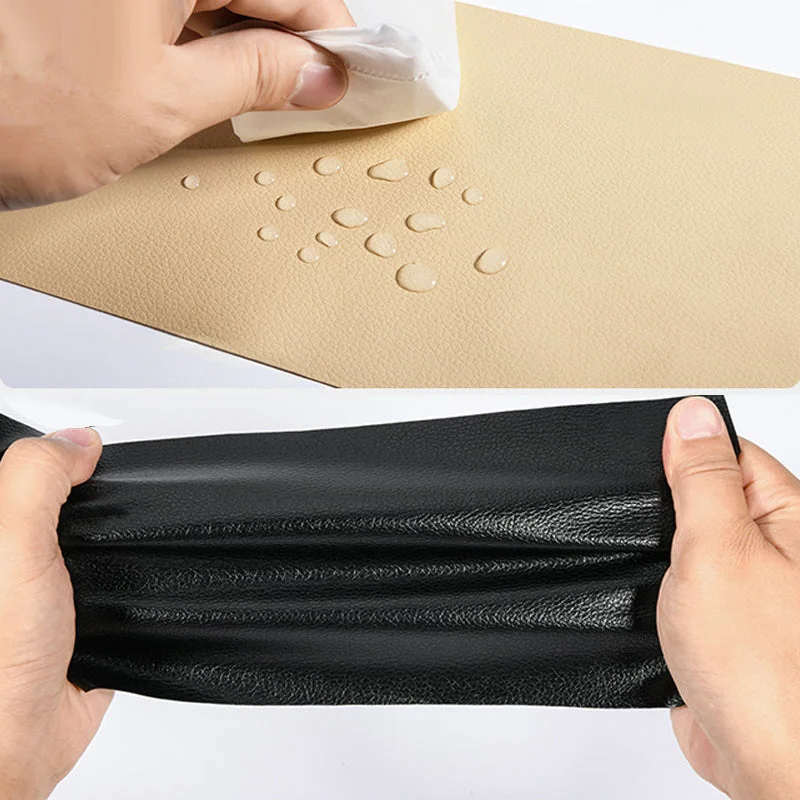 Water droplets on a beige repair sheet and a black sheet flexed by hand
