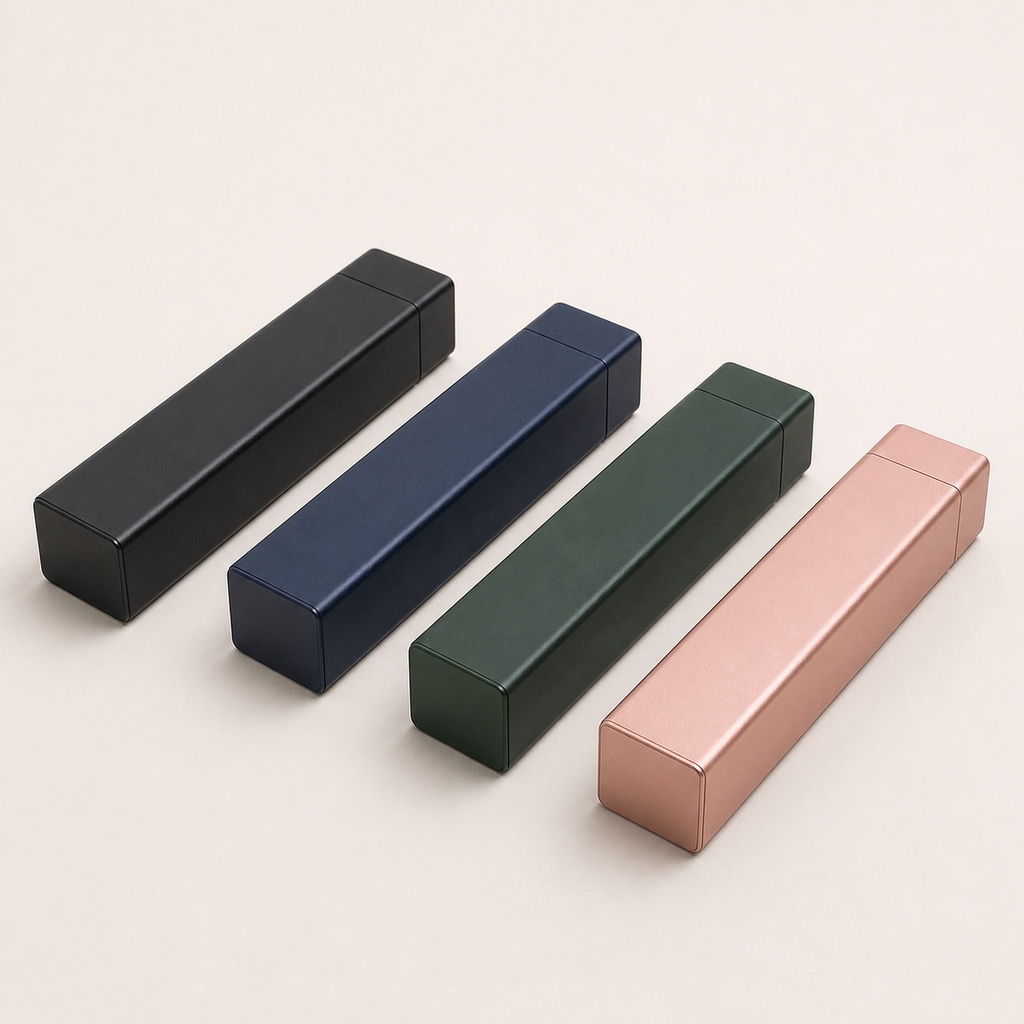 WeekVault organizers shown in black, navy, green, and rose gold